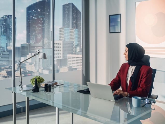 Portrait,Of,Innovative,Muslim,Businesswoman,Wearing,Burka,Sitting,At,Her